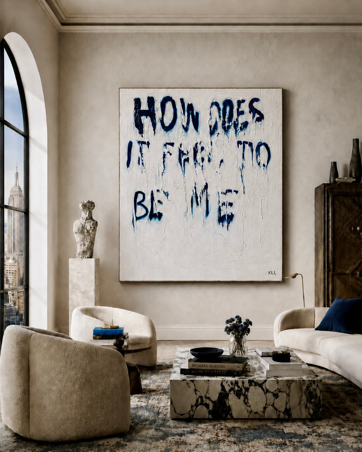 Modern living room with a large contemporary painting on the wall. Artwork title - How Does It Feel To Be Me?
