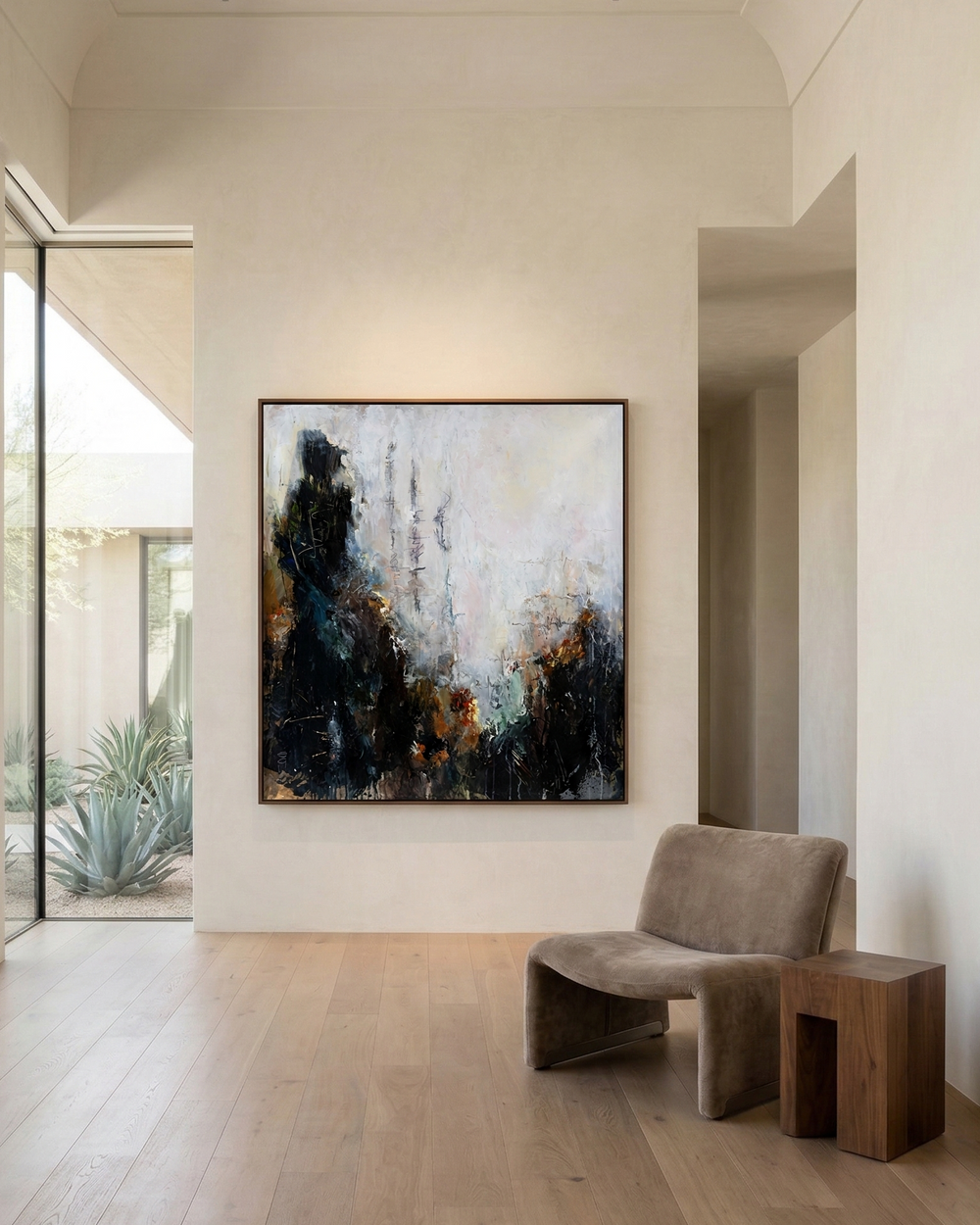 Modern interior with abstract painting on a wall, chair, and wooden bench.