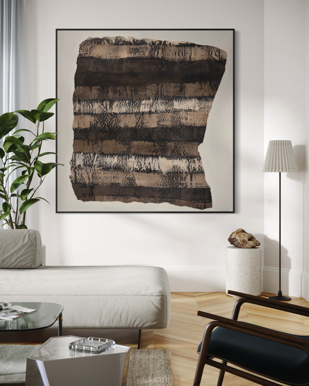 Modern living room with abstract art on the wall, sofa, and coffee table.