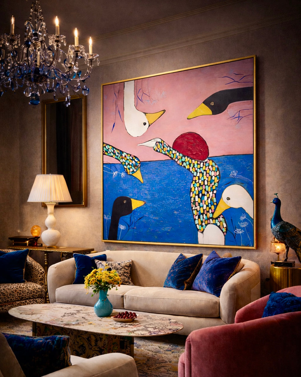 Living room with a colorful abstract painting of ducks, a chandelier, and a lamp.