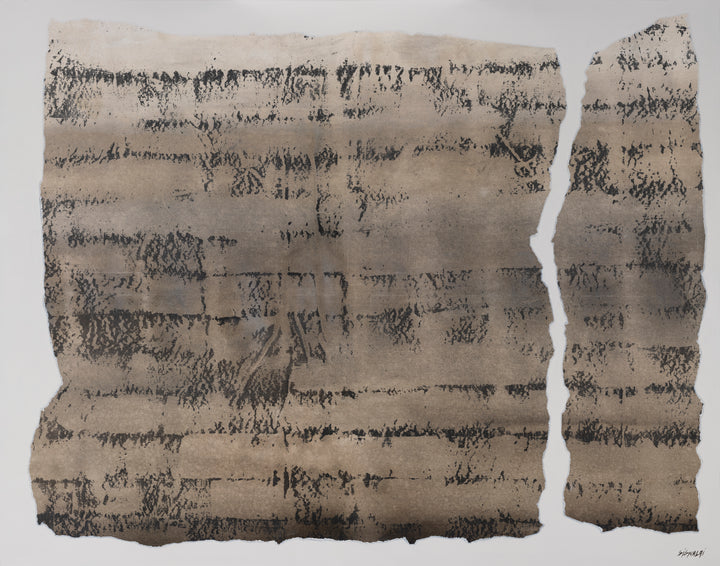 Fragment of cuneiform tablet with black text on a beige background