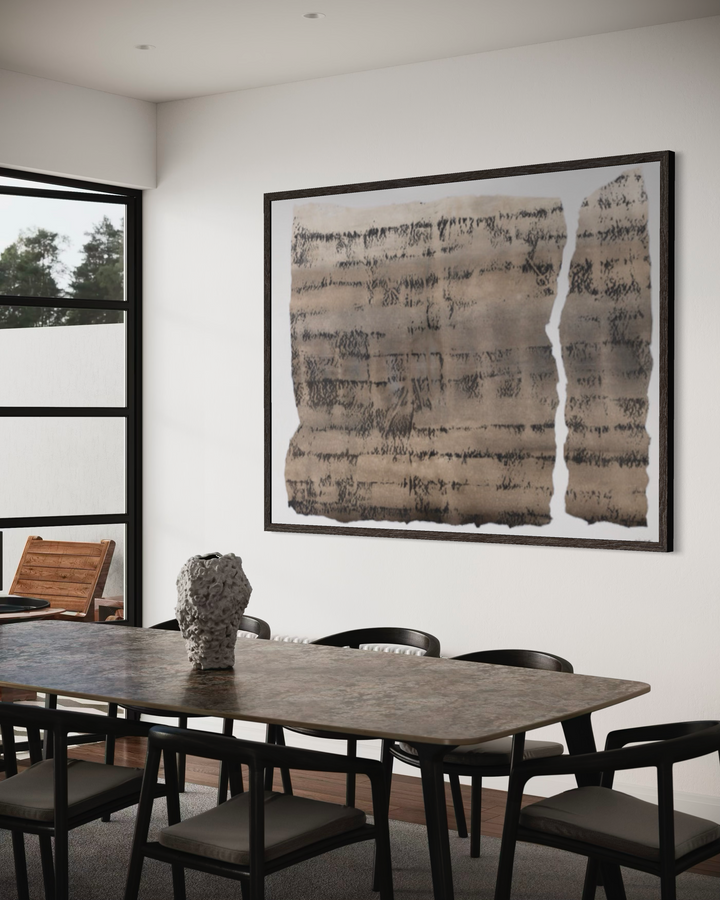 Dining room with a large abstract painting on the wall, wooden table, and chairs.