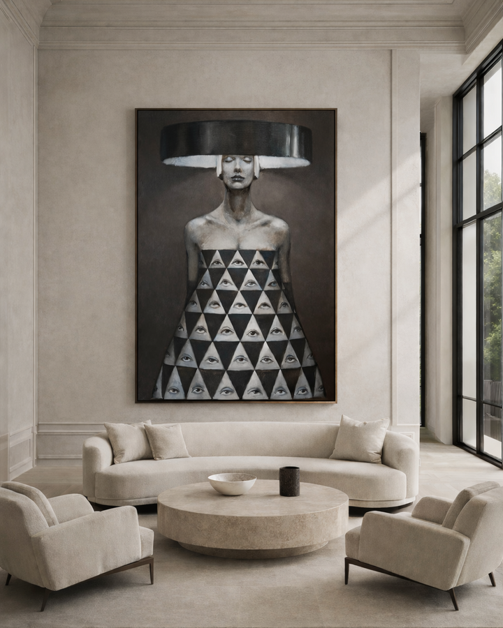 Modern living room with a large wall art piece of a woman wearing a geometric dress.