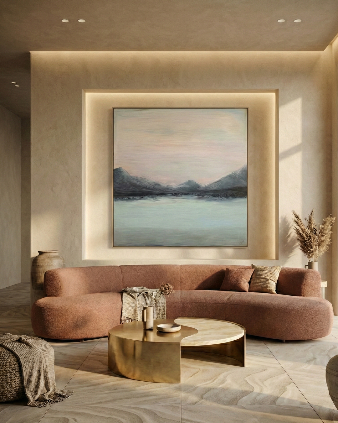 Modern living room with a pink sofa, gold coffee table, and a large wall art piece.