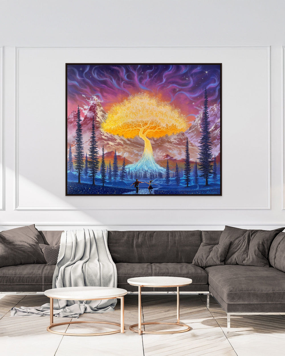 Framed artwork of a mystical forest scene with a large tree and vibrant colors in a modern living room.