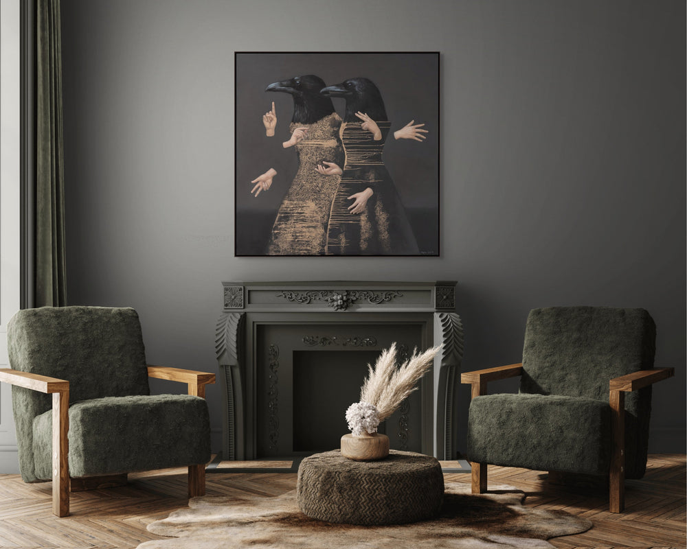 Living room with dark gray walls, two green armchairs, a fireplace, and a framed artwork above.